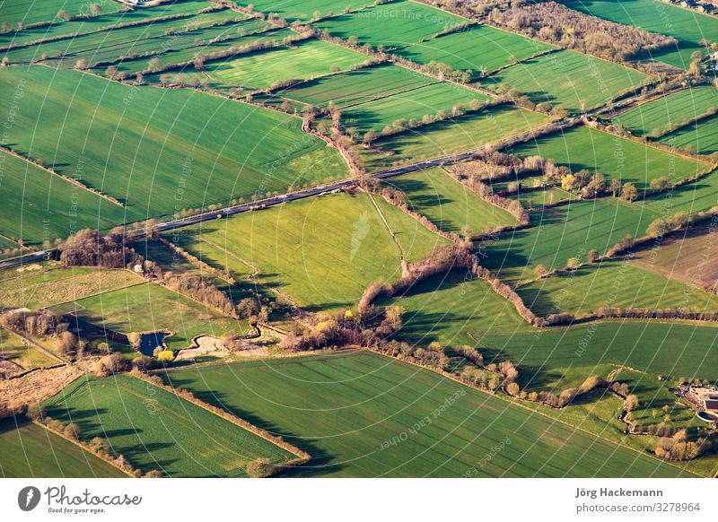 aerial view of green fields and slopes Vacation & Travel Summer Environment Nature Landscape Horizon Weather Tree Grass Meadow Transport Street Highway Aircraft