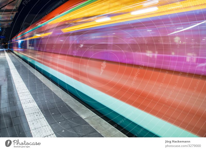 train with speed in train station Transport Railroad Commuter trains Underground Speed Station Germany Symbols and metaphors Blur Colour photo Motion blur
