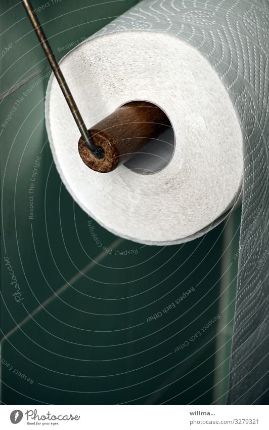a roll of toilet paper Toilet paper Toilet paper holder bathroom tiles Tile Body care tools Turquoise Nostalgia Arrangement Perforation Detail