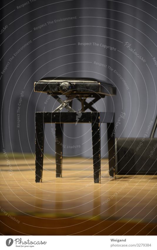stool Event Music Curiosity Serene Concert Stage Piano Stool Airplane takeoff Empty Interior shot Copy Space top Copy Space bottom Shallow depth of field