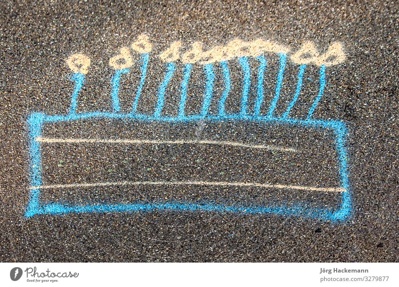drawing of a birthday cake at the street Lifestyle Joy Playing Summer Birthday Child Infancy Playground Street Candle Concrete Good Blue Yellow Pink Black
