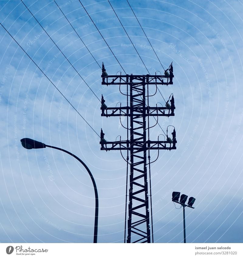 electricity tower and street lamp electric tower energy communication antenna cable minimal power voltage technology industry industrial line high voltage