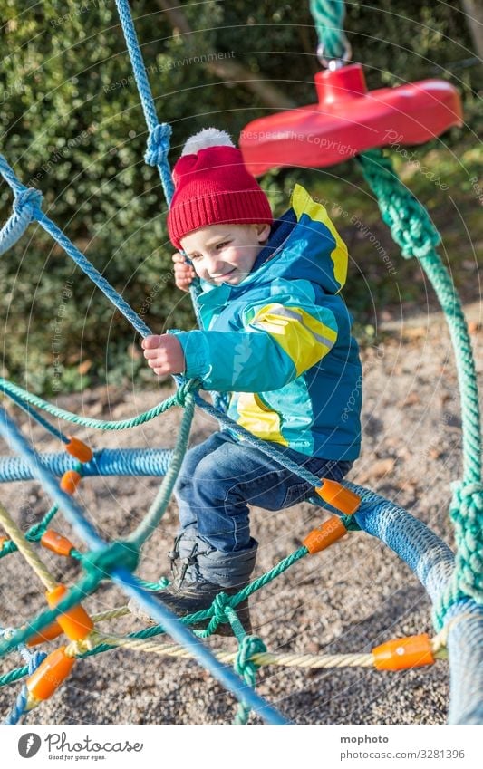 Boy on a climbing frame Toddler out three years experience Joy Scaffolding Jacket Boy (child) Child Infancy climbing scaffold Climbing Laughter smile Manly cap