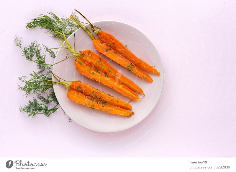 Delicious roasted carrots from above Food Vegetable Herbs and spices Lunch Dinner Vegetarian diet Diet Healthy Eating Fresh Natural Above Orange Pink Carrot