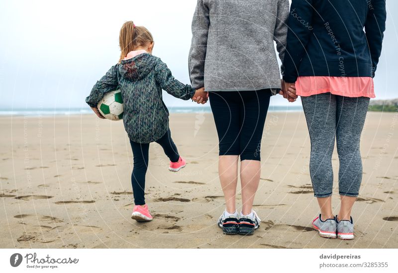 Three generations female watching the sea Lifestyle Playing Beach Ocean Child Human being Woman Adults Mother Grandmother Family & Relations Sand Autumn Fog