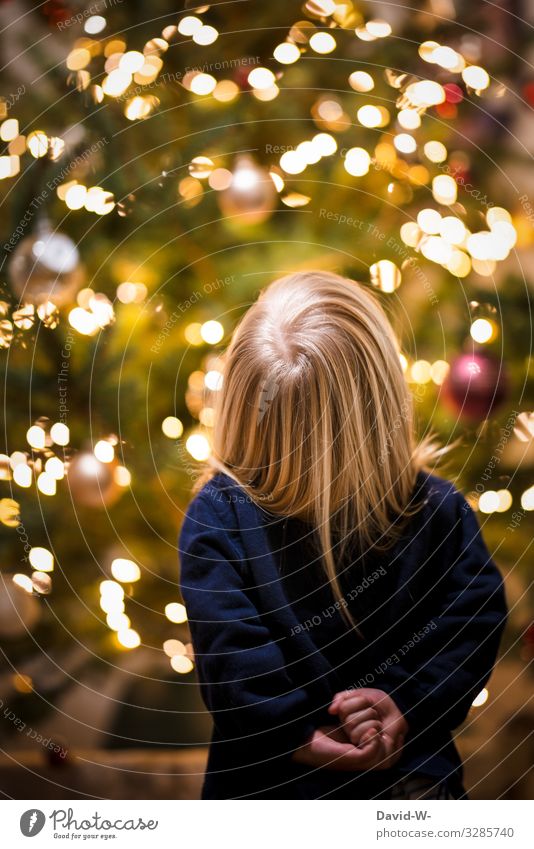 Christmas - child stands in awe in front of a Christmas tree Child reverence Joy Enthusiasm Anticipation Cute Belief Santa Claus Girl Fairy lights corona