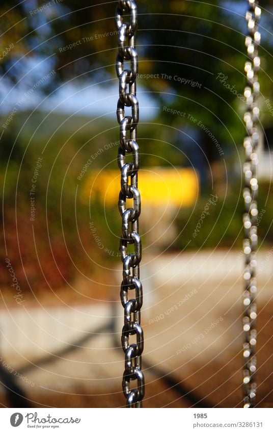 Iron rings Playing Children's game Swing Playground Iron chain Metal ring Beautiful weather To swing Glittering Cold Yellow Joy Happy Happiness