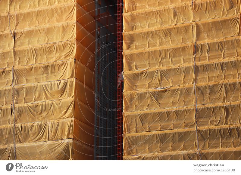covered building site Design Wall (barrier) Wall (building) Orange Covers (Construction) Construction site Build High-rise Hide Packaged Colour photo