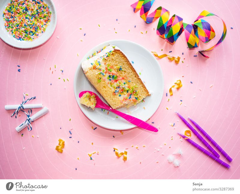 Cake piece with colorful crumbles and streamers Food Piece of gateau Granules To have a coffee Plate Spoon Overweight Feasts & Celebrations Carnival Birthday