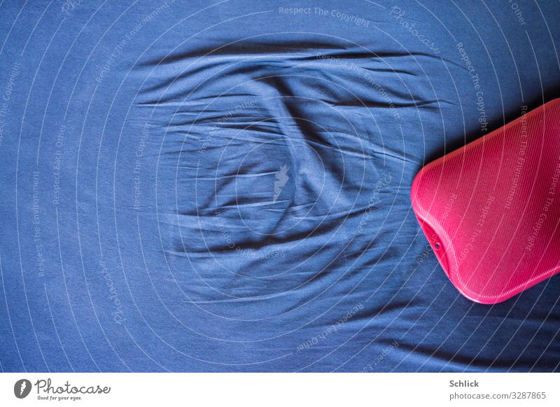 Cold nights Bed Bedroom Sheets sheet Hot water bag Couch tracks crease Arise Morning Winter chill colour contrast Red Blue wrinkled Start of day top view