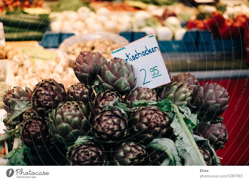 Artichokes and vegetables at the weekly market Food Healthy Markets Market stall Greengrocer Farmer's market Fresh Violet Colour photo Exterior shot Deserted