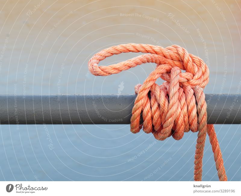 safe is safe Rope To hold on Firm Blue Gray Orange Safety Knot Loop Maritime Colour photo Exterior shot Deserted Copy Space top Copy Space bottom Isolated Image