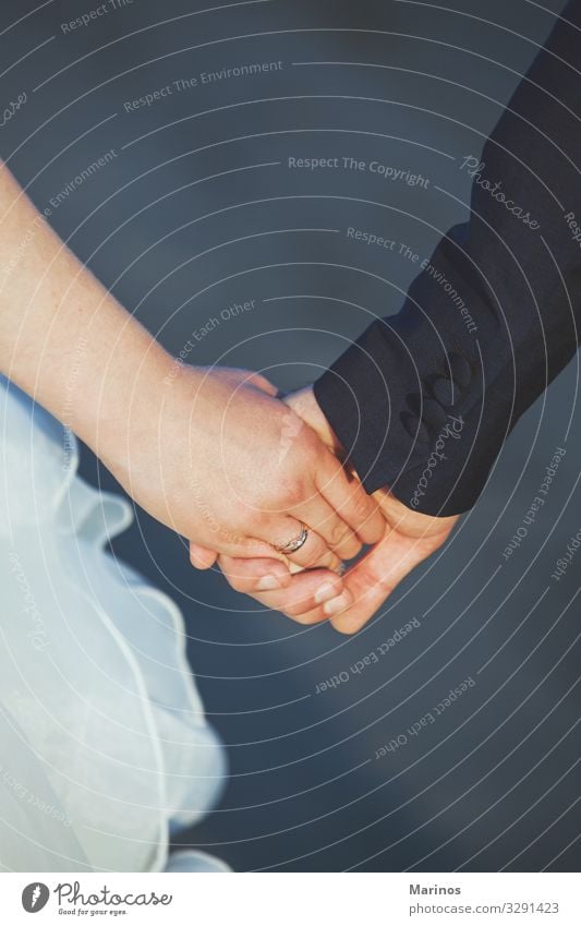 Wedding Couple Holding Hands A Royalty Free Stock Photo From Photocase