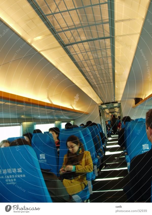 transrapid Maglev train Shanghai Asia China High-tech Transport Train station Railroad passenger compartment Seating railway seats Modern cabin almost Corridor