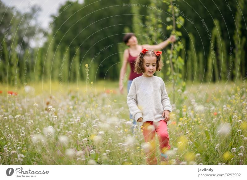 Mother with her little daughter in poppy field Lifestyle Joy Happy Beautiful Playing Child Human being Feminine Baby Woman Adults Parents Family & Relations