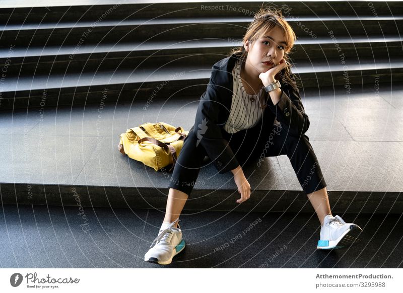 Cool woman on the stair. Lifestyle Style Beautiful Calm Vacation & Travel Closing time Human being Woman Adults Stairs Fashion Suit Jacket Sneakers Sit Wait
