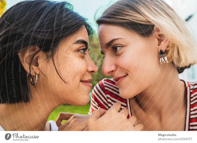 Loving lesbian couple having a date. Lifestyle Happy Leisure and hobbies Freedom Homosexual Woman Adults Couple Love Embrace Happiness Together Romance