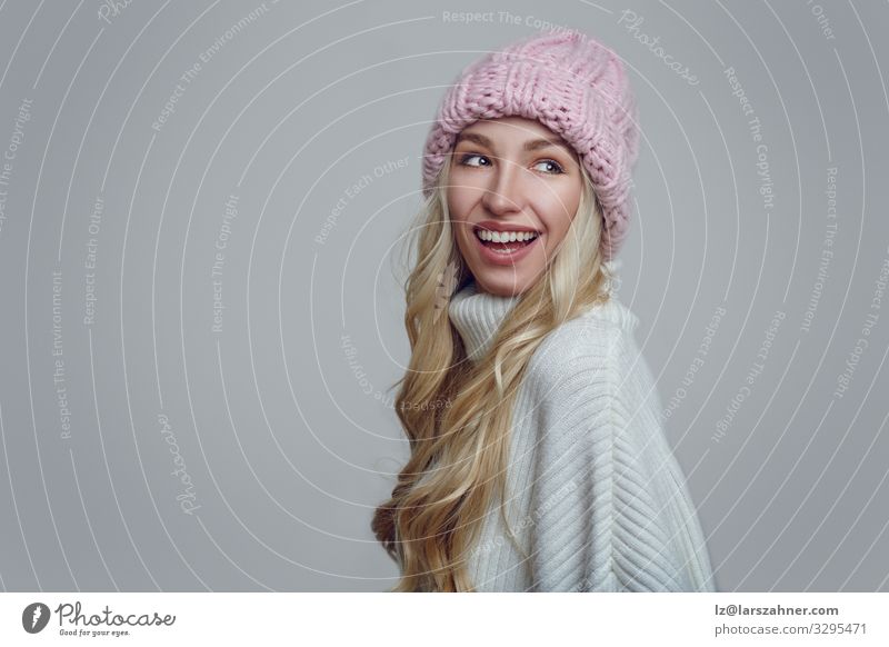 Smiling young woman in pink knitted winter hat Happy Beautiful Face Winter Woman Adults 1 Human being 18 - 30 years Youth (Young adults) Warmth Forest