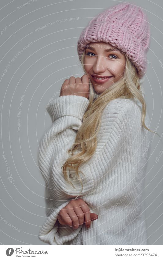 Smiling young woman in pink knitted winter hat Happy Beautiful Face Winter Woman Adults 1 Human being 18 - 30 years Youth (Young adults) Warmth Forest