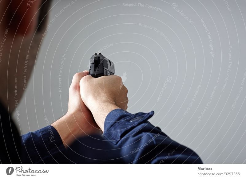 Police officer's hands aiming with gun. Human being Man Adults White Safety Safety (feeling of) police Handgun policeman Police Officer defense crime Aim