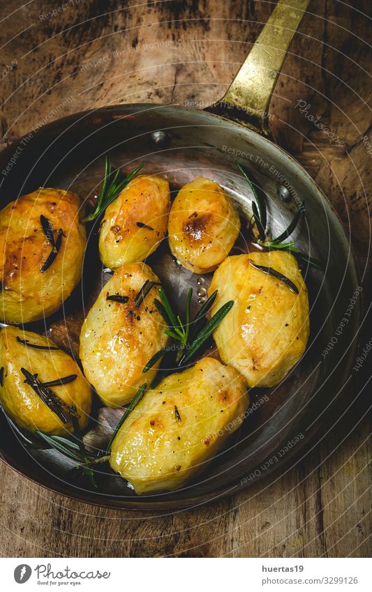 Homemade roasted potatoes with rosemary Food Vegetable Herbs and spices Lunch Vegetarian diet Diet Plate Healthy Eating Yellow Gold Potatoes Cooking Baking