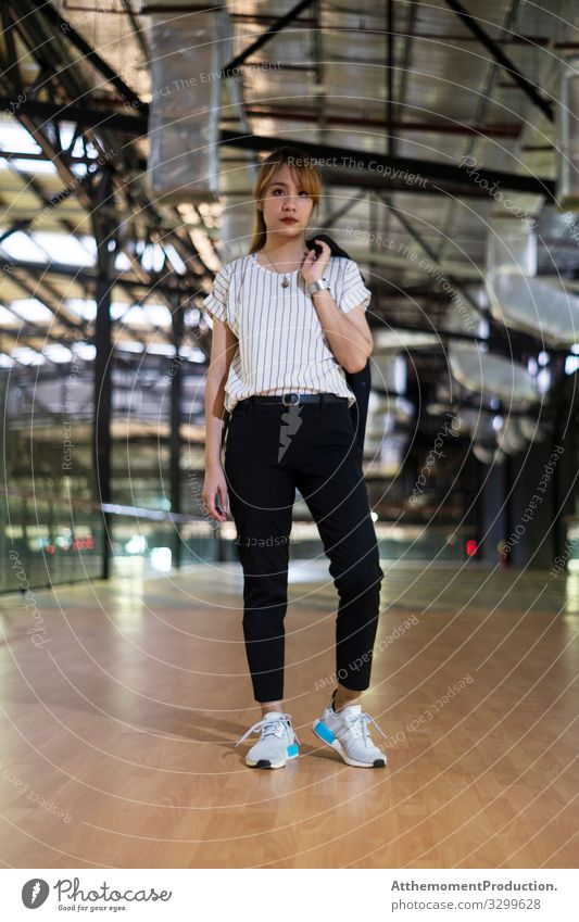 Cool woman at community mall. Lifestyle Elegant Style Beautiful Calm Vacation & Travel Closing time Human being Woman Adults Fashion Suit Jacket Sneakers