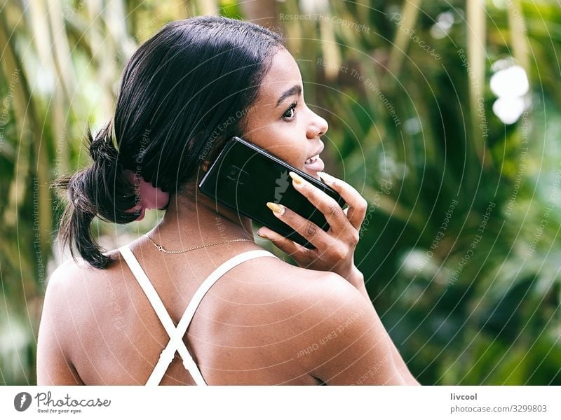 pretty woman talking with her phone II , cuba Lifestyle Happy Island Garden Telephone Human being Feminine Young woman Youth (Young adults) Woman Adults Head