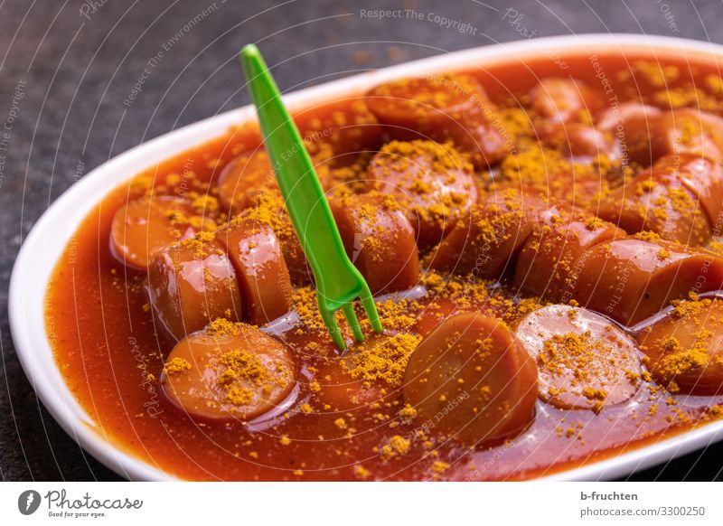 currywurst Food Sausage Nutrition Fast food Crockery Plate Fork Healthy Eating Unhealthy Hotdog Spicy Part Sauce Germany Dish Colour photo Interior shot