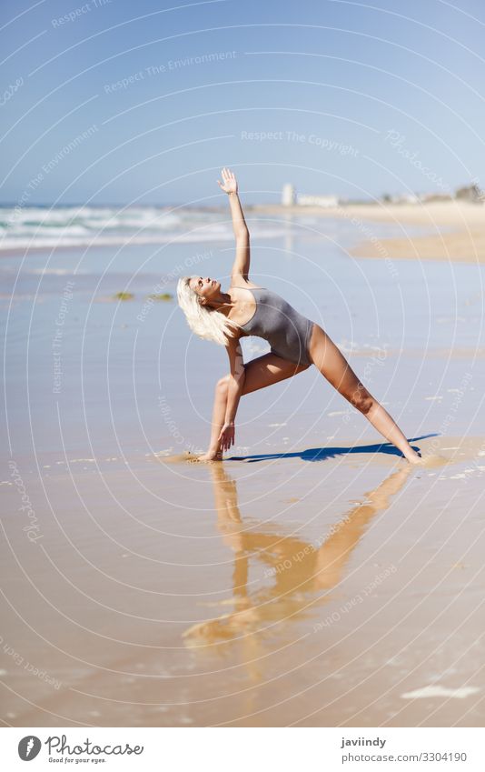 Caucasian blonde woman practicing yoga in the beach Lifestyle Beautiful Body Harmonious Relaxation Meditation Summer Beach Ocean Sports Yoga Human being