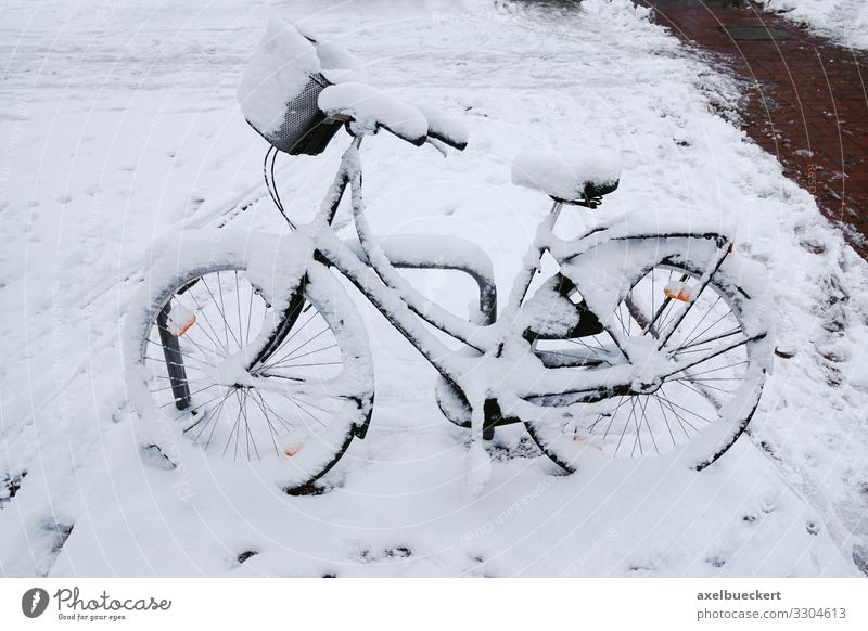 snowed-in bicycle Lifestyle Winter Climate Weather Ice Frost Snow Snowfall Town Transport Means of transport Traffic infrastructure Road traffic Cycling Street