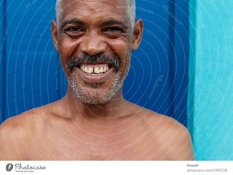 cuban man in a blue street , cuba Lifestyle Happy Island Human being Masculine Man Adults Skin Head Face Eyes Ear Nose Mouth Lips Teeth Facial hair Breasts Arm