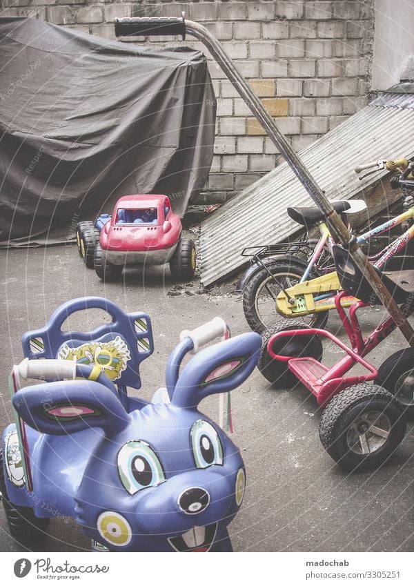 fleet Lifestyle Backyard Transport Means of transport Passenger traffic Cycling Tricycle Poverty Infancy Thrifty Dream Sadness Town Playing Toys Colour photo