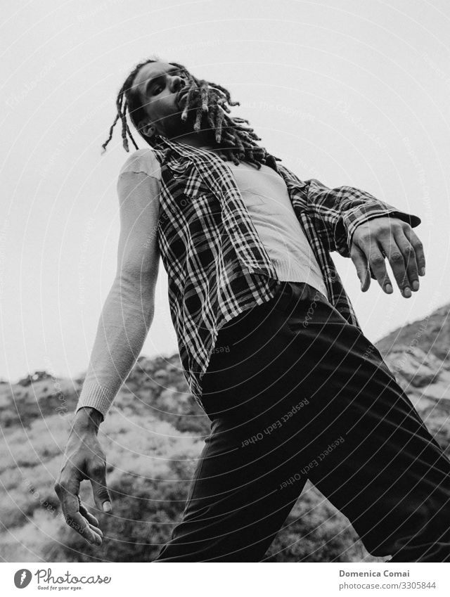 Man with Dreadlocks looking down Style Human being 1 Art Artist Fashion Facial hair Walking Esthetic Authentic Cool (slang) Elegant Hip & trendy Uniqueness