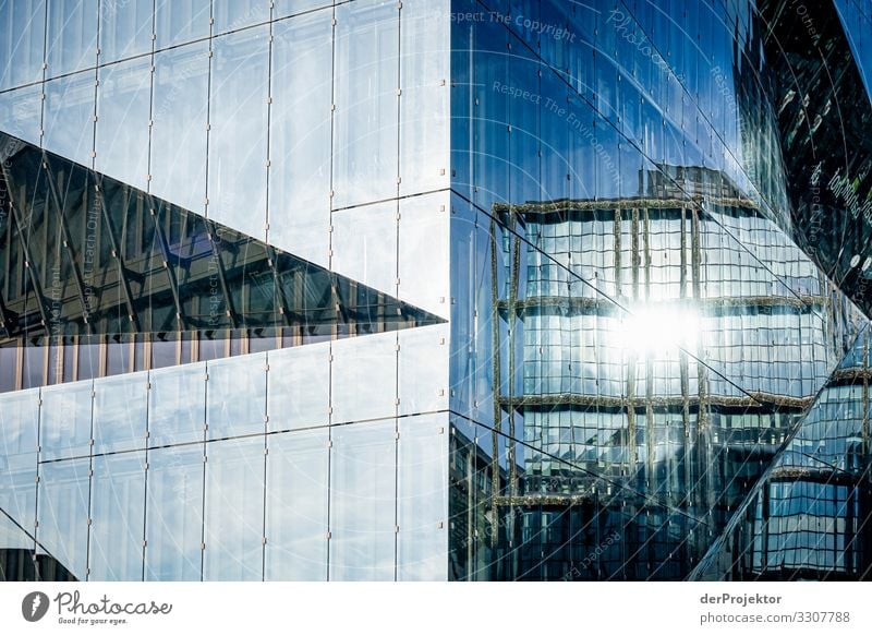 A cube mirrors itself High-rise Mirror image Central perspective Copy Space left Copy Space top Structures and shapes Copy Space right Exterior shot
