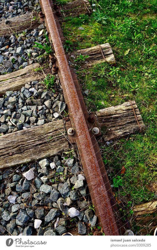 old abandoned railroad track in the station railway railway line train tracks transportation travel industry lane metal metallic infrastructure stone iron