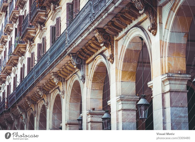 Arcades of a residential building Town Capital city Manmade structures Building Architecture Facade Balcony Terrace Window Stone Concrete Metal Steel Old