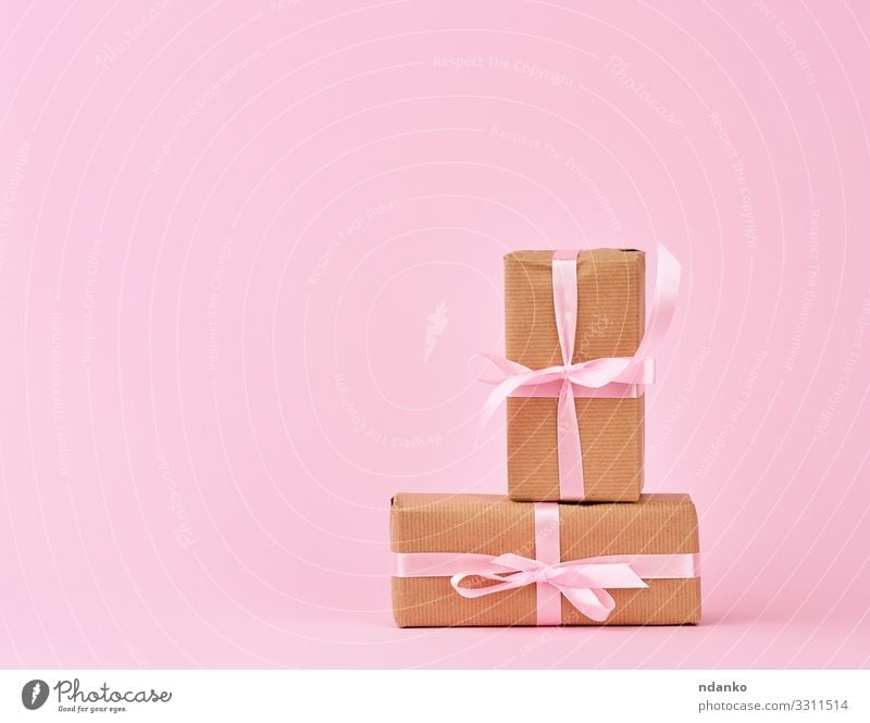 gifts in boxes wrapped in brown kraft paper Shopping Design Feasts & Celebrations Birthday Container Paper Packaging Package String Small Brown Pink Surprise