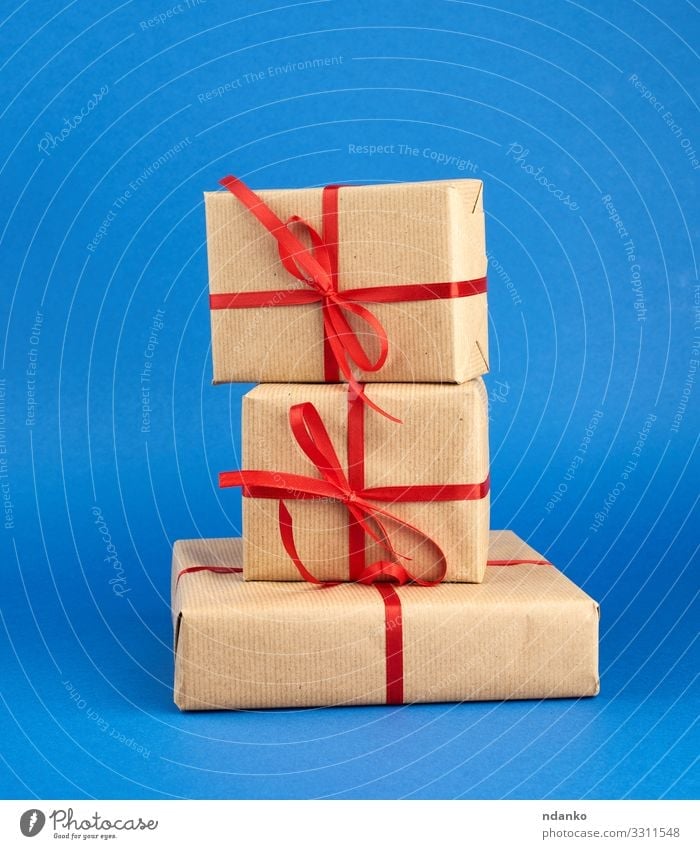 stack of boxes wrapped in brown paper Design Decoration Feasts & Celebrations Valentine's Day Christmas & Advent Wedding Birthday Craft (trade) Container Paper
