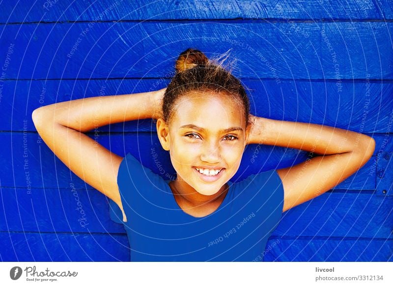 nice girl leaning on a blue pantone wall Lifestyle Style Happy Beautiful Playing Vacation & Travel Trip Island Child Human being Feminine Girl Infancy Head