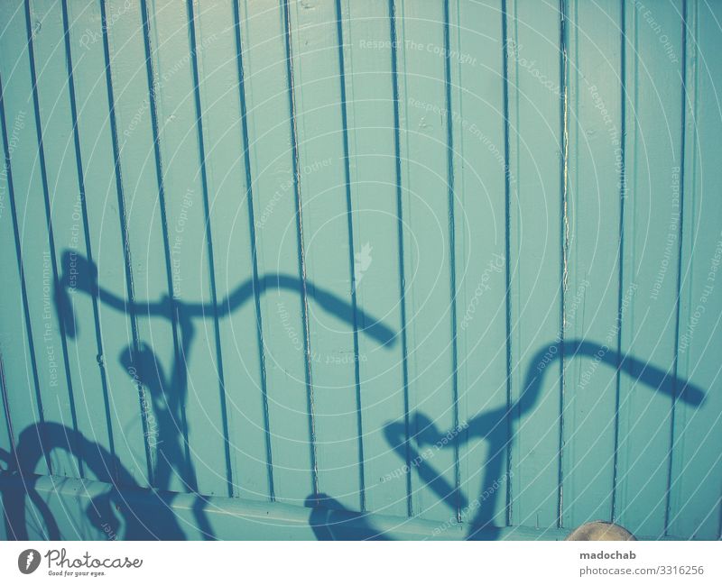 tandem Bicycle Shadow Wall (building) Mobility urban Cycling Exterior shot Means of transport Road traffic Town Driving Transport Cycling tour Movement