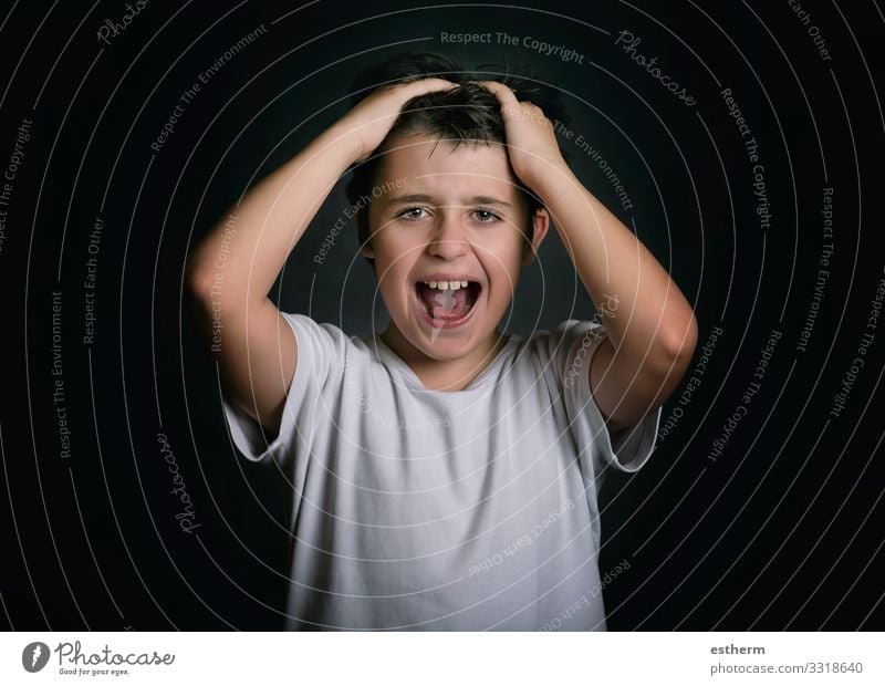 angry and stressed child with his hands on his head Human being Masculine Child Family & Relations Infancy 1 8 - 13 years To talk Fitness Scream Sadness