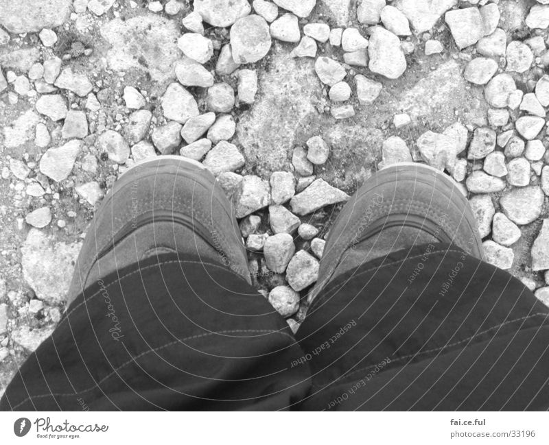 Small feet Bird's-eye view Symmetry Pants Footwear Feet Stone Black & white photo Stand