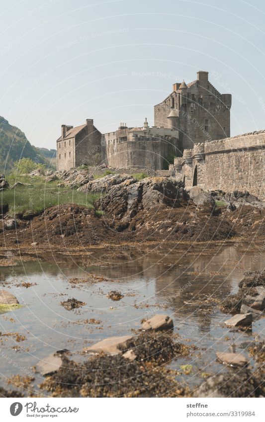 Castle in Scotland Ocean Isle of Skye Nature Landscape Vacation mood Exterior shot Travel photography Island Tourism Romance Tourist Attraction Low tide