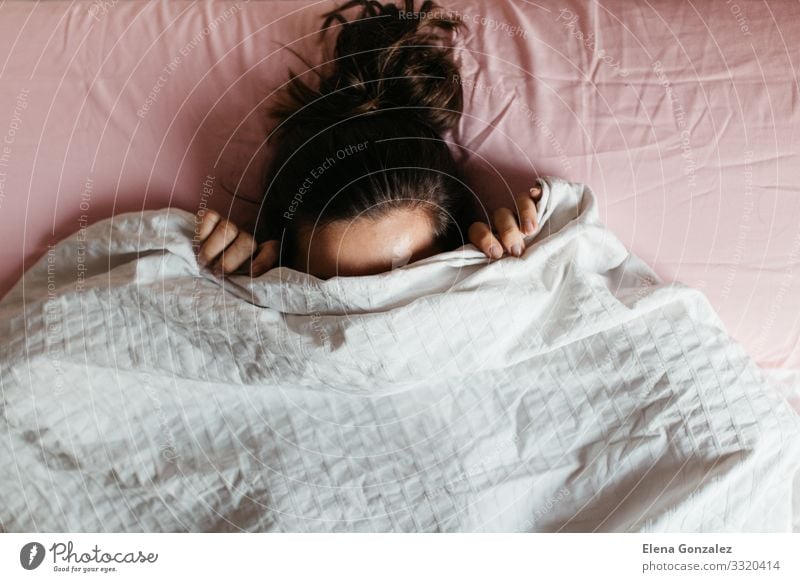 Playful young woman hiding face under blanket Face Relaxation Woman Adults Smiling Sleep Long Emotions Shame Fear Stress Comfortable Scare dreams Terror Anxious