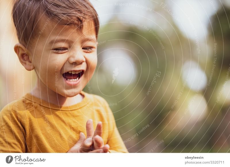 happy young boy playing outdoors in the park Lifestyle Joy Happy Leisure and hobbies Playing Child Boy (child) Man Adults Family & Relations Friendship Infancy