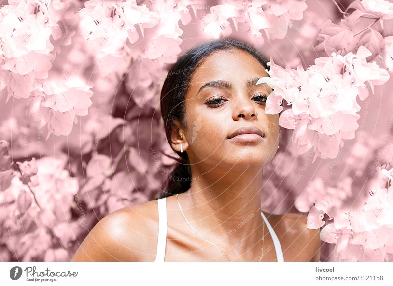 beautiful young woman among pink flowers Lifestyle Happy Island Garden Human being Feminine Young woman Youth (Young adults) Woman Adults Skin Head Face Eyes