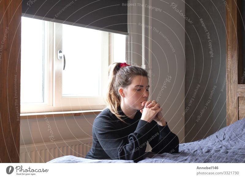 Religious Praying Woman is praying at her bed Beautiful Face Meditation Human being Adults Hand Church Old Love Sadness Dark Black White Hope Distress Peace