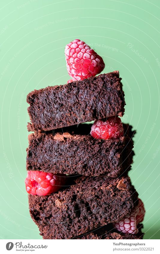 Stack of brownies with frozen raspberries. Chocolate cake pile Cake Dessert Funny Cute american dessert aqua menthe brownies squares brownies stack cacao cake