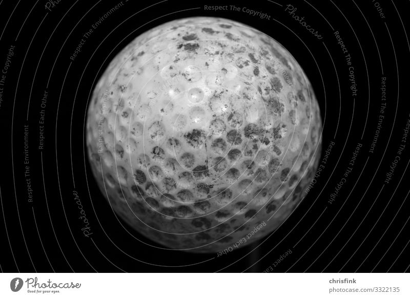 Golf ball in front of black background Lifestyle Luxury Care of the elderly Athletic Playing Sports Ball sports Sign Dirty Round White Golf course