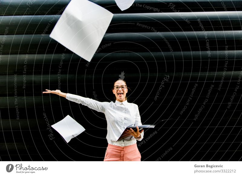Young businesswoman throwing up paper documents Lifestyle Beautiful Success Work and employment Profession Business Human being Woman Adults Stand Throw Modern